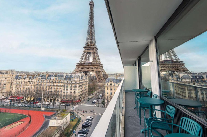 kamer in Pullman Paris Tour Eiffel met zicht op de Eiffeltoren